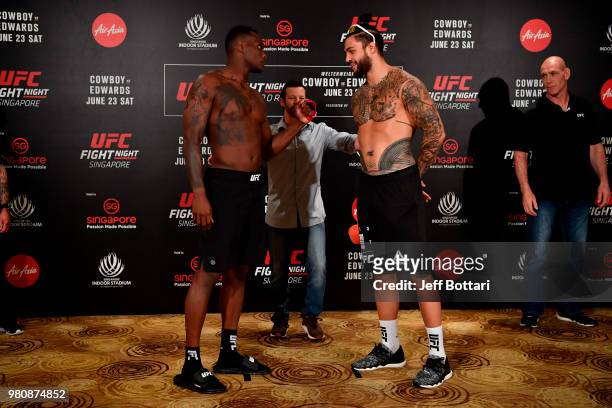Opponents Ovince Saint Preux of the United States and Tyson Pedro of Australia face off during the UFC Fight Night weigh-in at the Mandarin Oriental...