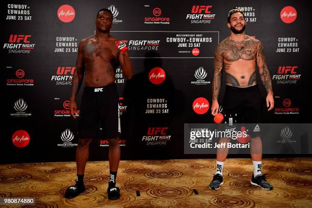 Opponents Ovince Saint Preux of the United States and Tyson Pedro of Australia pose for the media during the UFC Fight Night weigh-in at the Mandarin...