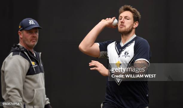 Australian fast bowler James Pattinson sends down a delivery in the nets as he trains with the Victorian cricket team in Melbourne on June 22, 2018....