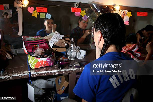 Actress Hiromi prepares herself backstage of the play 'Hairspray' at Manolo Fabregas Theater on March 26, 2010 in Mexico City, Mexico.