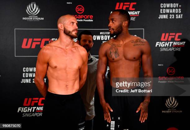 Opponents Donald Cerrone of the United States and Leon Edwards of Jamaica pose for the media during the UFC Fight Night weigh-in at the Mandarin...