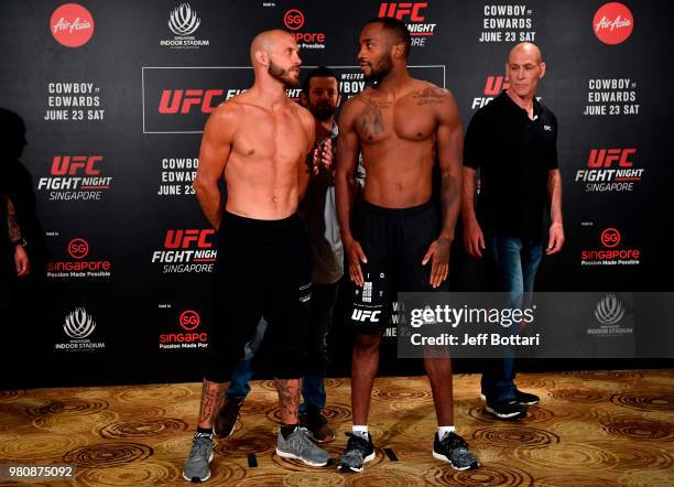 Opponents Donald Cerrone of the United States and Leon Edwards of Jamaica pose for the media during the UFC Fight Night weigh-in at the Mandarin...