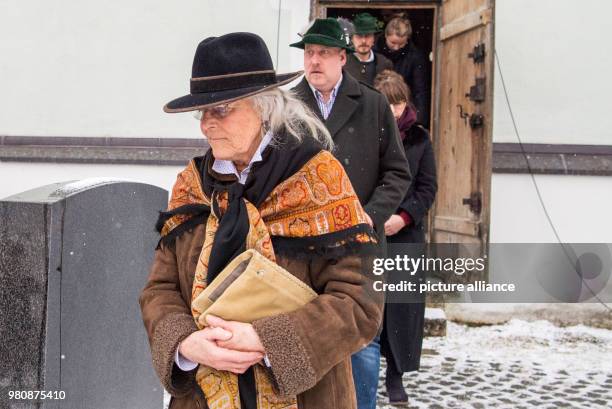 March 2018, Germany, Habach: The widow Karin Rauch leaves the church after the memorial service for 'Traumschiff' captain Siegfried Rauch. The actor...