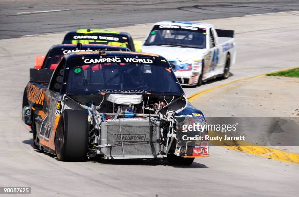 Jason White drives the Gunbroker.com Dodge during the NASCAR Camping World Truck Series Kroger 250 at Martinsville Speedway on March 27, 2010 in...