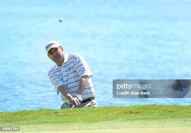 Loren Roberts chips onto the 15th green during the second round of The Cap Cana Championship on March 27, 2010 on the Jack Nicklaus Course at Punta...