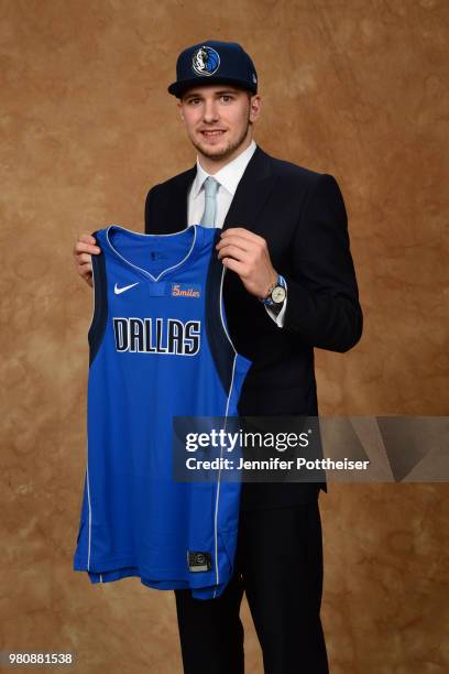 Luka Doncic poses for a portrait after being drafted by the Dallas Mavericks during the 2018 NBA Draft on June 21, 2018 at Barclays Center in...