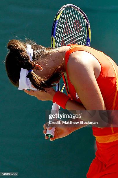 Ana Ivanovic of Serbia reacts against Agnieszka Radwanska of Poland during day five of the 2010 Sony Ericsson Open at Crandon Park Tennis Center on...
