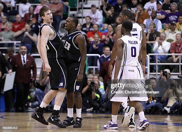 Gordon Hayward and Shelvin Mack of the Butler Bulldogs celebrate after Hayward hit a three point shot against the Kansas State Wildcats during the...