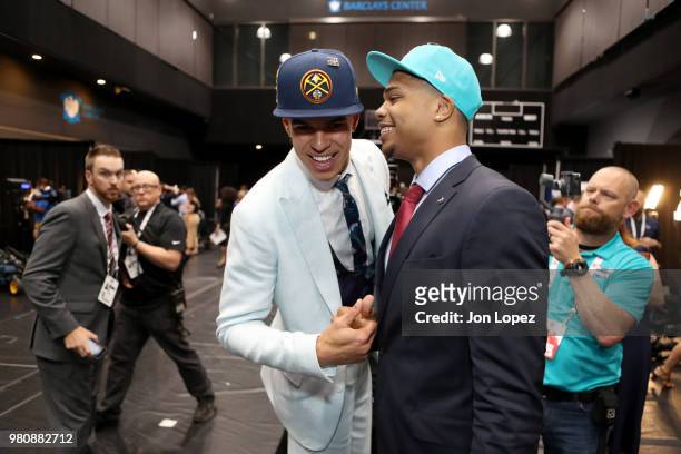 Michael Porter Jr. And Miles Bridges shake hands at the 2018 NBA Draft on June 21, 2018 at the Barclays Center in Brooklyn, New York. NOTE TO USER:...