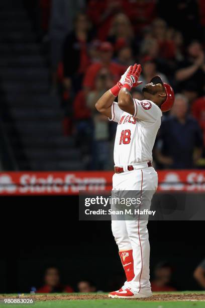 Luis Valbuena of the Los Angeles Angels of Anaheim reacts after hitting a two-run homerun during the fifth inning of a game against the Toronto Blue...