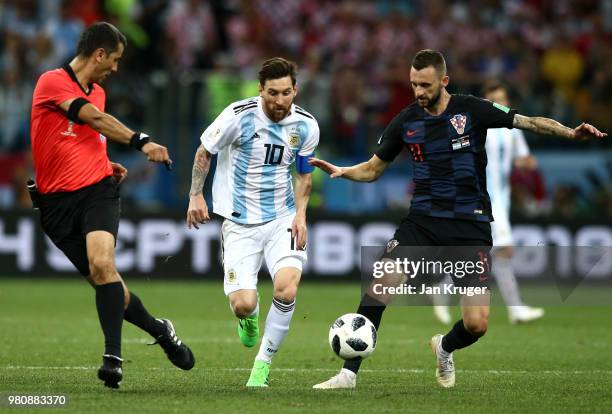 Lionel Messi of Argentina is tackled by Marcelo Brozovic of Croatia during the 2018 FIFA World Cup Russia group D match between Argentina and Croatia...