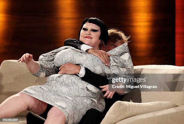 Singer Beth Ditto sits down on Hansi Hinterseer during the 188th 'Wetten dass ...?' show at Messezentrum Salzburg on March 27, 2010 in Salzburg,...