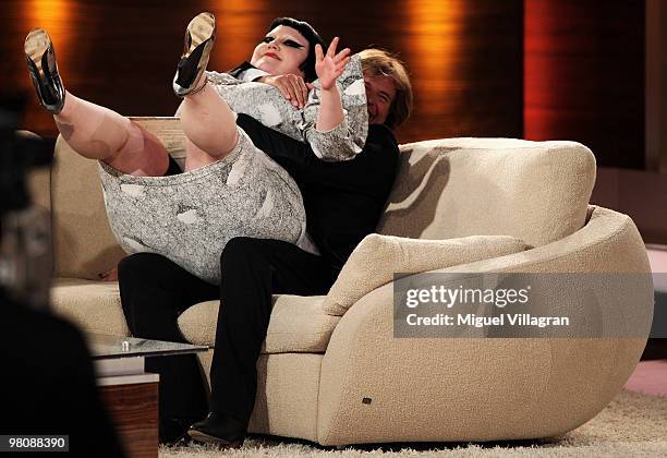 Singer Beth Ditto sits down on Hansi Hinterseer during the 188th 'Wetten dass ...?' show at Messezentrum Salzburg on March 27, 2010 in Salzburg,...