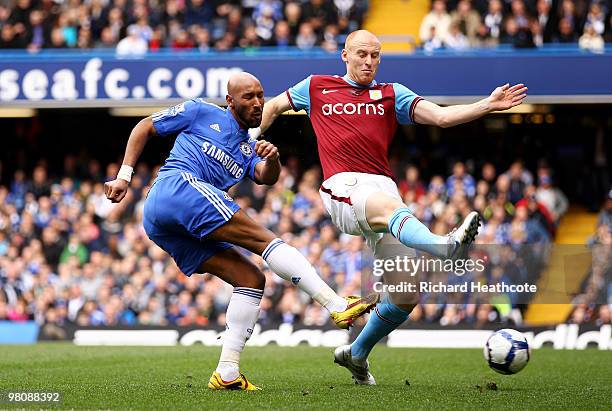 Nicolas Anelka of Chelsea is closed down by James Collins of Aston Villa during the Barclays Premier League match between Chelsea and Aston Villa at...