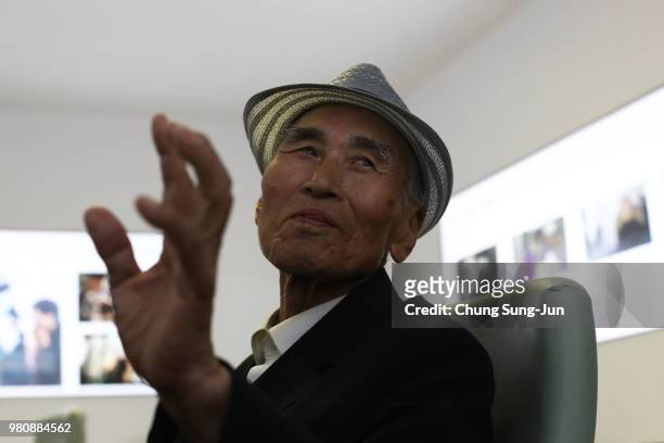 South Korean Yoo Ki-Jin waits his turn to fill out application forms to reunite with his family members living in North Korea, at the Korea Red Cross...