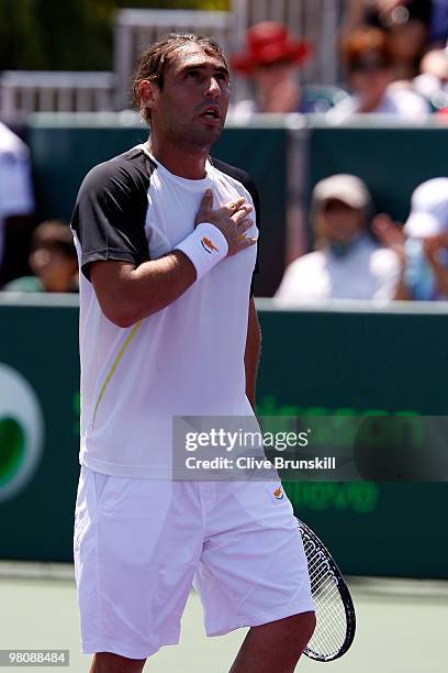 Marcos Baghdatis of Cyprus celebrates after defeating Juan Ignacio Chela of Argentina during day five of the 2010 Sony Ericsson Open at Crandon Park...