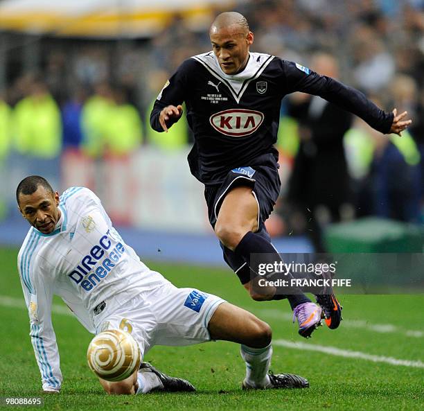 Marseille's midfielder Edouard Cisse vies with Bordeaux' midfielder Geraldo Mauricio Silva Wendel during the League Cup final football match...