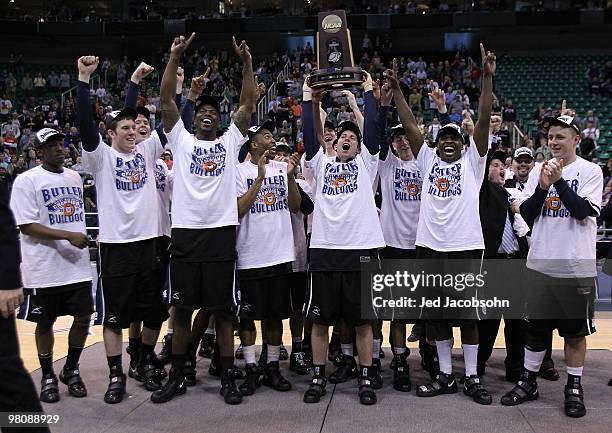 Members of the Butler Bulldogs celebrate after defeating the Kansas State Wildcats during the west regional final of the 2010 NCAA men's basketball...