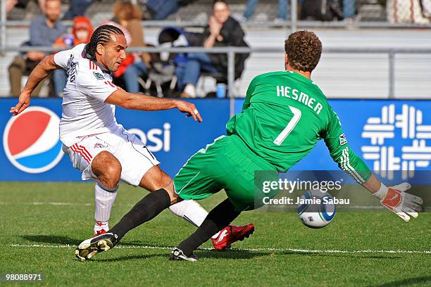 Goalkeeper William Hesmer of the Columbus Crew makes a save on a shot from forward Dwayne De Rosario of the Toronto FC on March 27, 2010 at Crew...