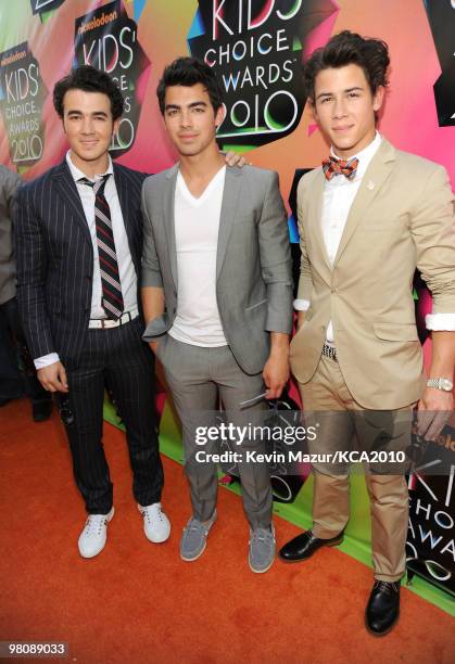 Musicians Kevin Jonas, Joe Jonas and Nick Jonas of Jonas Brothers arrive at Nickelodeon's 23rd Annual Kids' Choice Awards held at UCLA's Pauley...