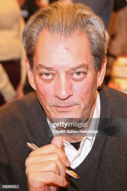 Paul Auster signs copies of his book at the 30th salon du livre at Porte de Versailles on March 27, 2010 in Paris, France.