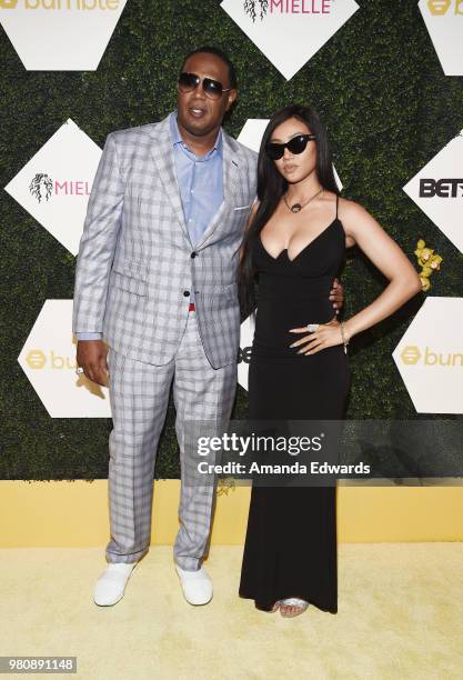 Rapper Master P and singer-songwriter Cymphonique Miller arrive at the BET Her Awards Presented By Bumble at The Conga Room at L.A. Live on June 21,...