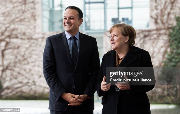 March 2018, Germany, Berlin: German Chancellor Angela Merkel receives Irish Prime Minister Leo Varadkar with military honours at the German...