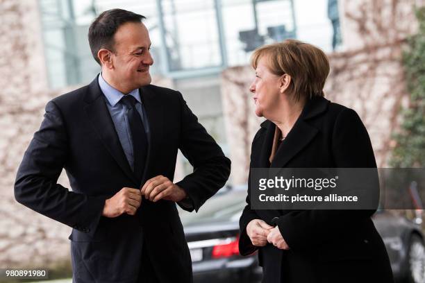 March 2018, Germany, Berlin: German Chancellor Angela Merkel receives Irish Prime Minister Leo Varadkar with military honours at the German...