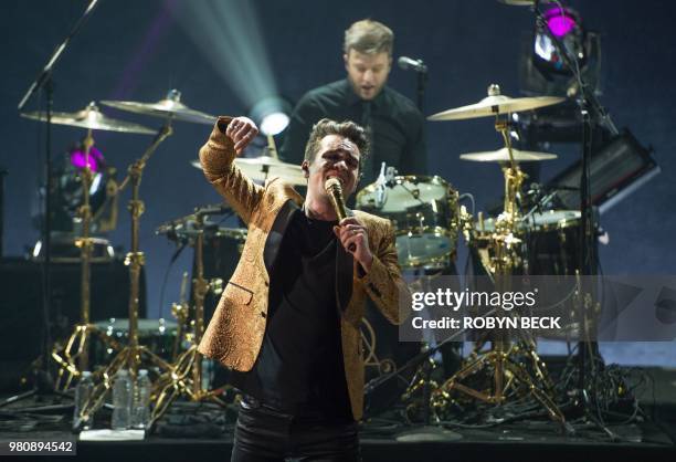 Lead singer of US band Panic! At The Disco, Brendon Urie, performs on stage at the iHeartRadio Album Release Party at the iHeartRadio Theater in...