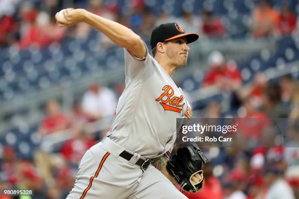 Starting pitcher Kevin Gausman of the Baltimore Orioles throws to a Washington Nationals batter in the first inning at Nationals Park on June 21,...