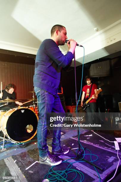 Mark Devine, James Graham and Johnny Docherty of The Twilight Sad perform on stage at The Harley on March 27, 2010 in Sheffield, England.