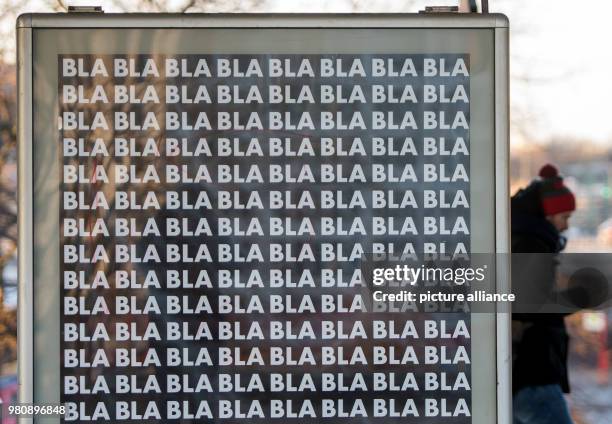 March 2018, Germany, Hamburg: A poster for the online platform "watson.de" with the inscription Blabla hanging in front of a station. Photo: Daniel...