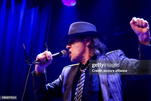 March 2018, Germany, Hamburg: Udo Lindenberg singing onstange during the opening of "Panic City - The Udo-Lindenberg-Experience". The musician...