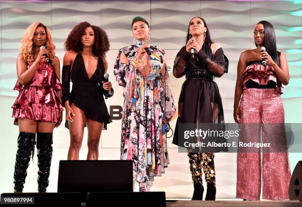 Singers Kristal Lyndriette Brienna DeVlugt, Gabby Carreiro, Kristal Lyndriette and Ashly Williams of June's Diary perform onstage at the BETHer...