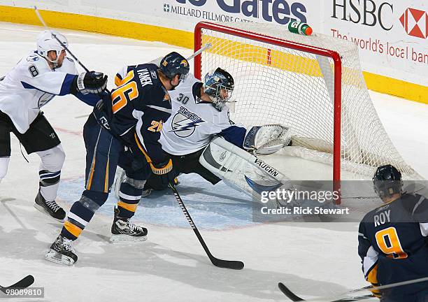 Thomas Vanek and Derek Roy of the Buffalo Sabres watch Roy's shot hit the back of the net past Antero Niittymaki of the Tampa Bay Lightning at HSBC...