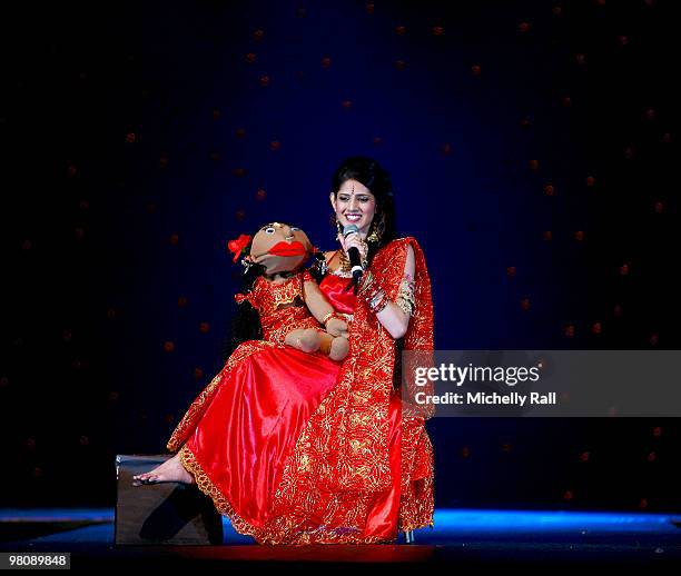 Miss South Africa, Kajal Lutchminarain performs with a puppet during the Miss India Worldwide Finals performs at the Durban International Convention...