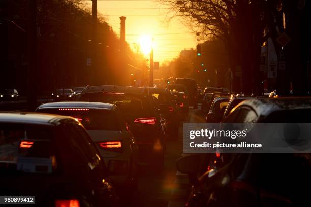 March 2018, Germany, Cologne: A traffic jam during the morning rush hour. The Verdi union has called warning strikes in the public sector, causing...