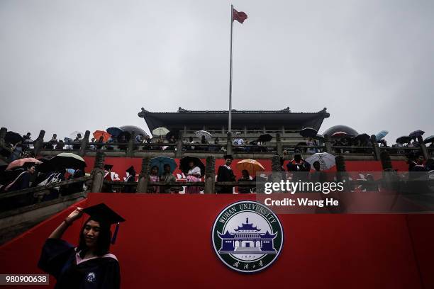 Graduates poses take pictures after their ceremony of Wuhan University on June 22, 2018 in Wuhan, China.China is forecast to produce 8.2 million...