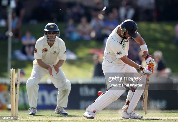 Mathew Sinclair of New Zealand is bowled by Mitchell Johnson of Australia during day two of the Second Test Match between New Zealand and Australia...