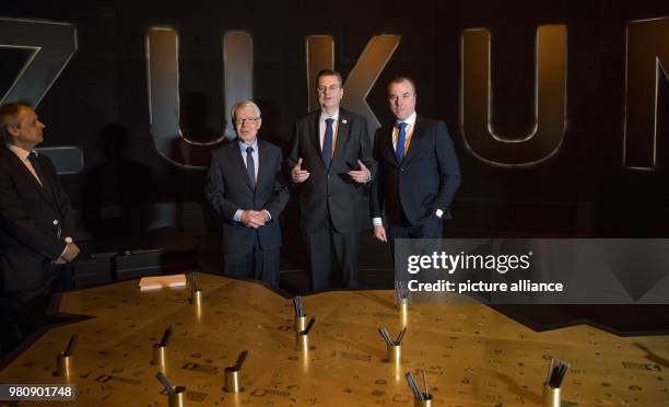 March 2018, Germany, Dortmund: President of the German Football League Reinhard Rauball , German Football Association President Reinhard Grindel and...