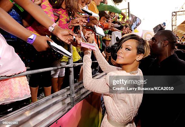 Singer Rihanna signs augtographs as she arrives at Nickelodeon's 23rd Annual Kids' Choice Awards held at UCLA's Pauley Pavilion on March 27, 2010 in...