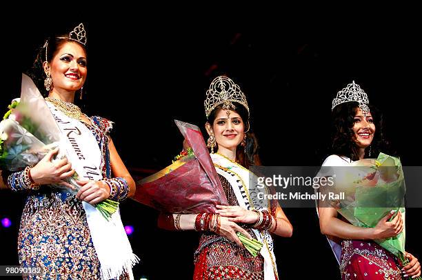 Miss South Africa Kajal Luthchminarain is crowned Winner of the Miss India Worldwide 2010 flanked by Miss Suriname Cher Marchand second Princess and...