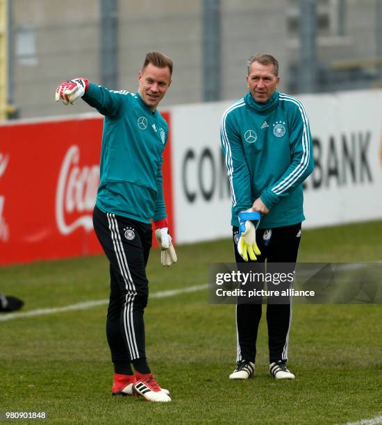 Germany goalkeeper Marc-Andre ter Stegen and goalkeepeing coach Andreas Koepke take part in a training session ahead of Friday's international soccer...