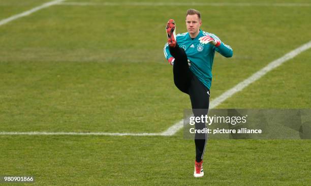 March 2018, Germany, Duesseldorf: Germany team training session: Germany goalie Marc-Andre ter Stegen warming up. Germany are due to play Spain in a...
