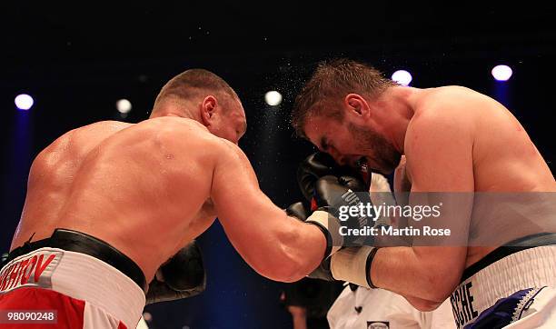 Steffen Kretschmann of Germany fights Denis Bakhtov of Russia during the heavyweight PABA championship fight during the ran boxen knockout Night of...