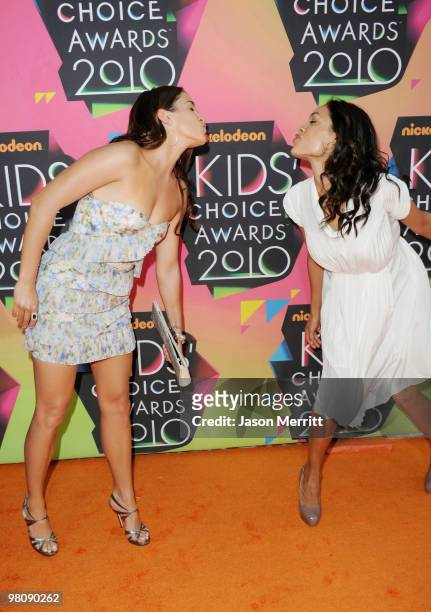 Actress Nikki Reed and Rosario Dawson kiss as they arrive at Nickelodeon's 23rd Annual Kids' Choice Awards held at UCLA's Pauley Pavilion on March...