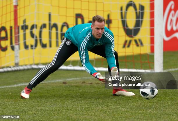 Dpatop - Germany goalkeepers Marc-Andre ter Stegen works out with the ball during a training session ahead of Friday's international soccer friendly...