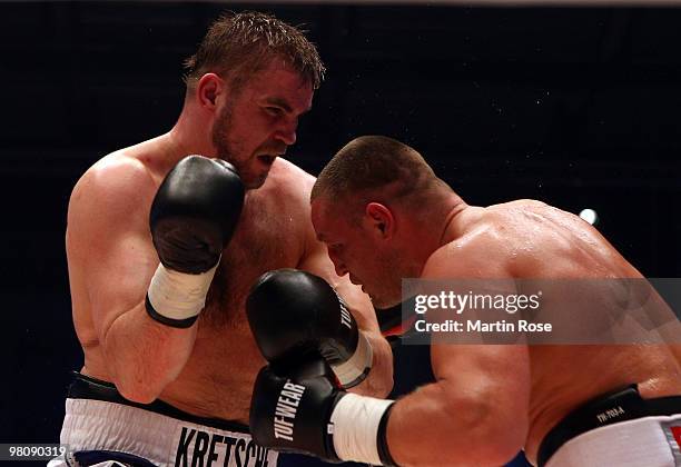 Steffen Kretschmann of Germany fights Denis Bakhtov of Russia during the heavyweight PABA championship fight during the ran boxen knockout Night of...