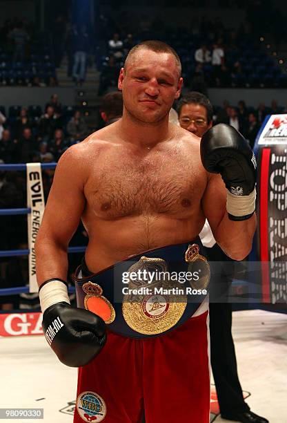 Denis Bakhtov of Russia poses with the trophy after the heavyweight PABA championship fight during the ran boxen knockout Night of Champions at the...