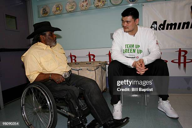 Yao Ming of the Houston Rockets helps fill hygiene bags for the homeless on March 26, 2010 at the SEARCH Homeless Shelter in Houston, Texas. NOTE TO...